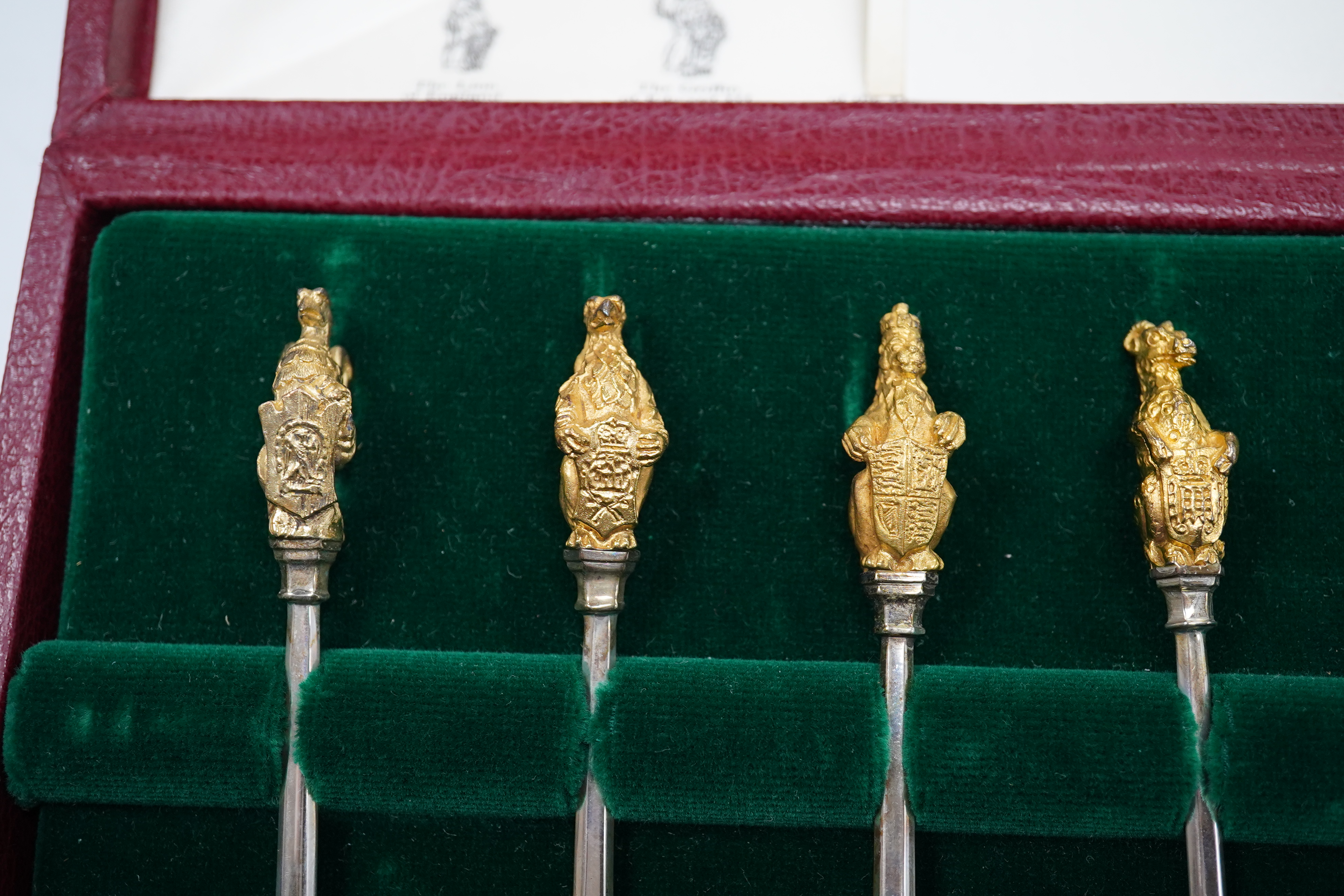 An Elizabeth II cased set of ten parcel gilt silver limited edition 'The Queens Beasts' commemorative spoons, by William Comyns & Sons Ltd, London, 1972, 11.8cm, 10.7oz. Condition - fair to good